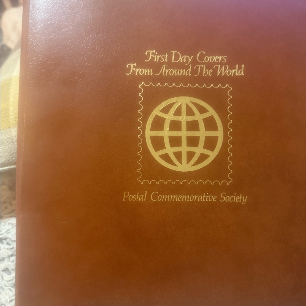 Postal Commemorative Society Album, first-day stamp issue.